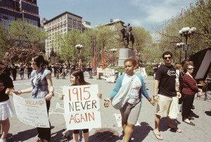 Armenian youth activists, along with sympathetic bystanders, protest Turkish denial of the Armenian Genocide.