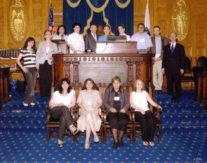 The CYSCA social worker group from Armenia visiting the Massachusetts State House of Representatives, where they were briefed about the social work system by State Reps Alice Wolf (back center), Jon Hecht (back right), and Peter Koutoujian.