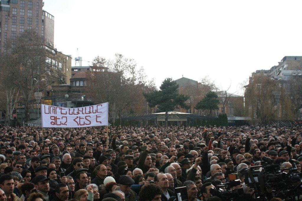 Opposition leader Raffi Hovannisian addressed a large crowd gathered at Freedom Square on Feb. 24, saying that a new flood surges in Armenia today to cleanse the country. (Photo by Khatchig Mouradian)
