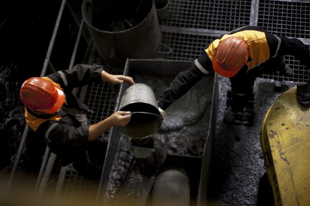 Mine workers at the Zangezur Copper-Molybdenum processing plant in Kajaran handling toxic heavy metals without breathing protection or protective gloves.  (Photo by Nazik Armenakyan)