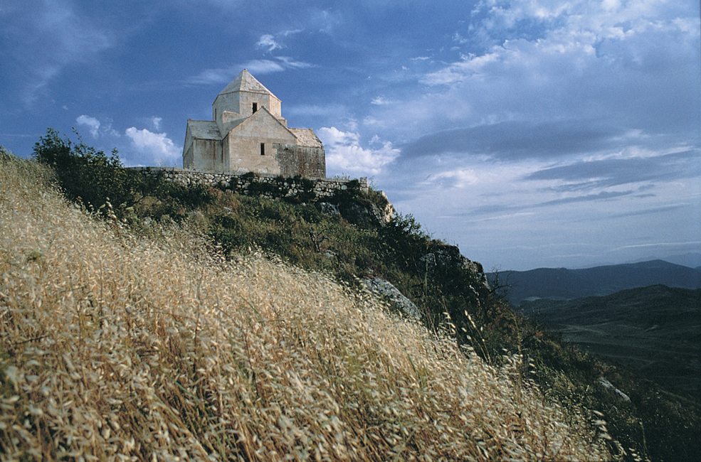 The mountaintop monastery of Vankasar stands vigil high above the ruins of Tigranakert, in the Askeran region of Artsakh. The ruins of the Tigranakert of Artsakh date back to the first century BC. Photo © 2013 Matthew Karanian
