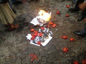 Following the extradition of Ramil Safarov, Armenians took to the streets of Yerevan, burning pictures of the axe-murderer and chucking tomatoes at the Hungarian Embassy. (Twitter photo by @Vozni)