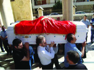 Unger Misak Bashgezenian’s coffin covered by the ARF flag. (Photo by Raffi Sulahian, June 1)