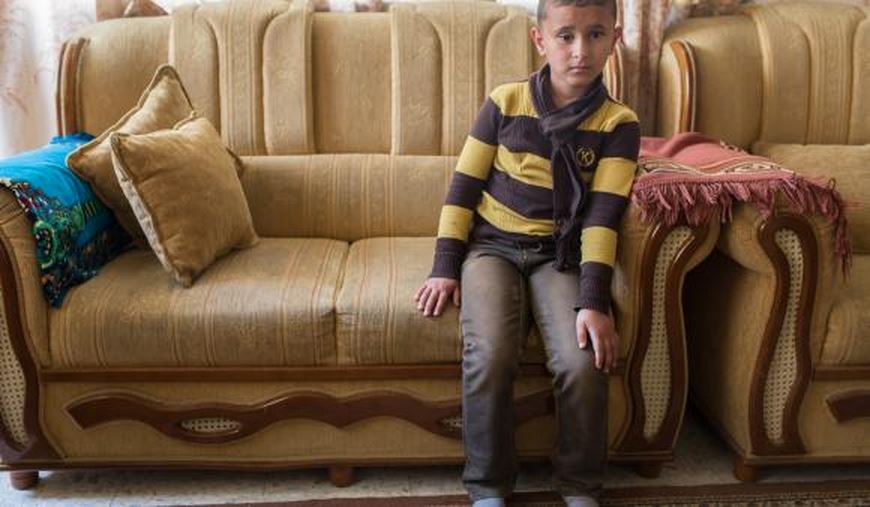 6-year-old Mousab now wears a glass eye after he was hit directly in the right eye with a rubber-coated metal bullet. (Photo: DCI Palestine)