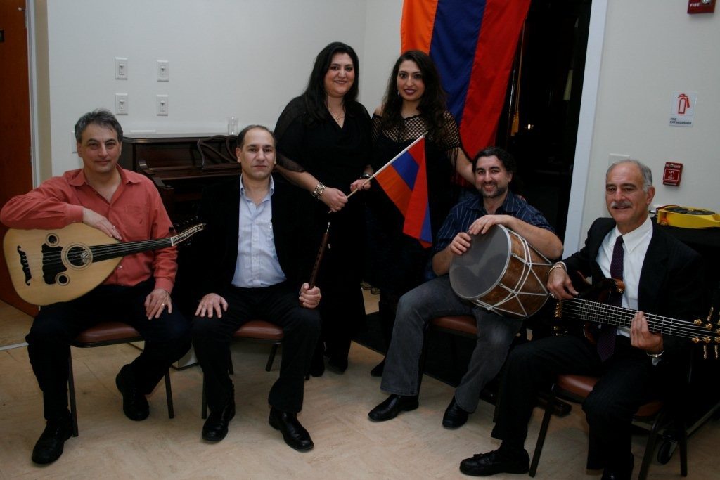  The Arev Folk Ensemble performing at a recent concert in North Andover.  (L-R) John Kozelian, Martin Haroutunian, Tamar Melkonian, Ani Zargarian, Fabio Pirozzolo, and Stepan Megerdichian. (Photo: Tom Vartabedian)