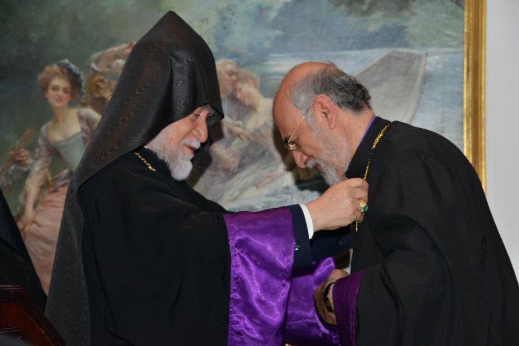 His Holiness offers Archbishop Choloyan a Banakeh commemorating the 100th anniversary and in recognition of his services to the Church