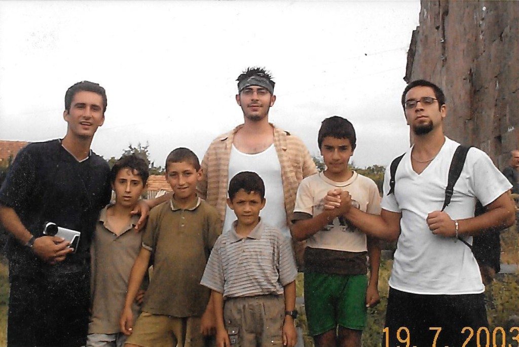 Hovig Apo Saghdejian and fellow Land and Culture Organization volunteers with the children of Ayroum in the summer of 2003