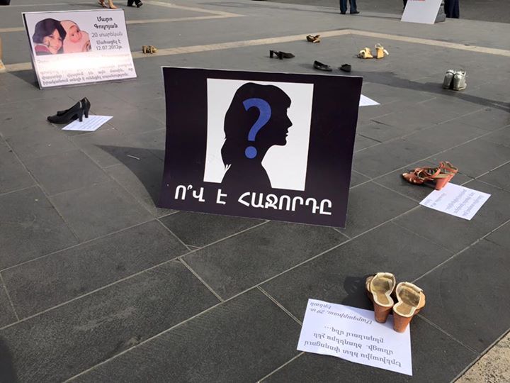 A poster featuring the silhouette of a woman and a question mark read, 'Who will be next?'