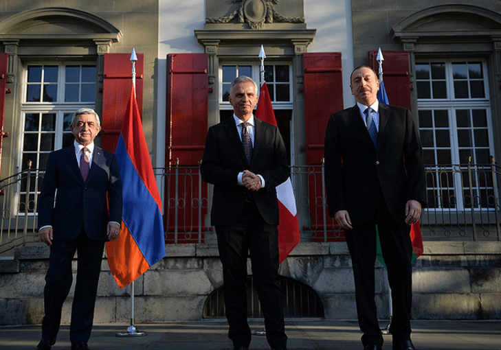 (L-R) Armenian President Serge Sarkisian, Swiss Foreign Affairs Minister Didier Burkhalter, Azerbaijani President Ilham Aliyev