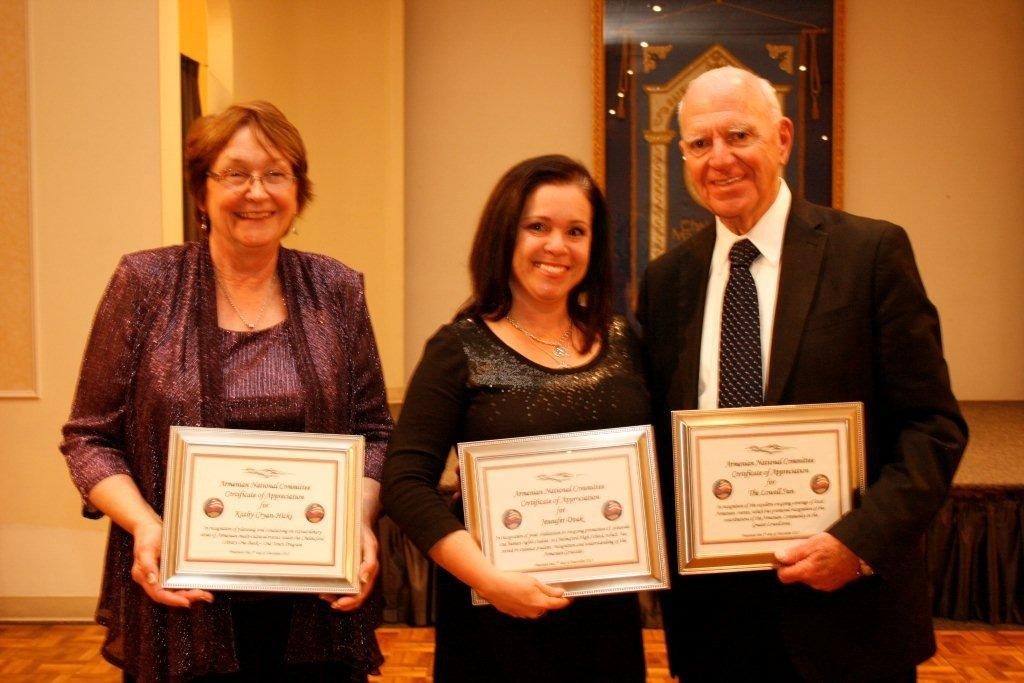 Community Service Awards were presented to (L-R) Kathy Cryan-Hicks, Jennifer Doak, and Kendall Wallace, accepting for the Lowell Sun.