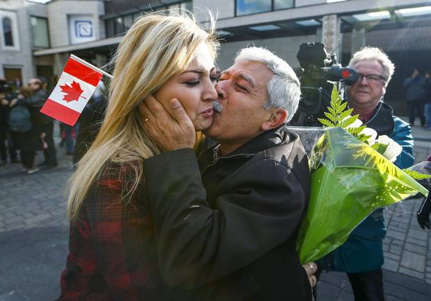 Maria Karageozian is reunited with her father Hagop, a Syrian refugee who arrived earlier this morning at the Armenian Community Center in Toronto.