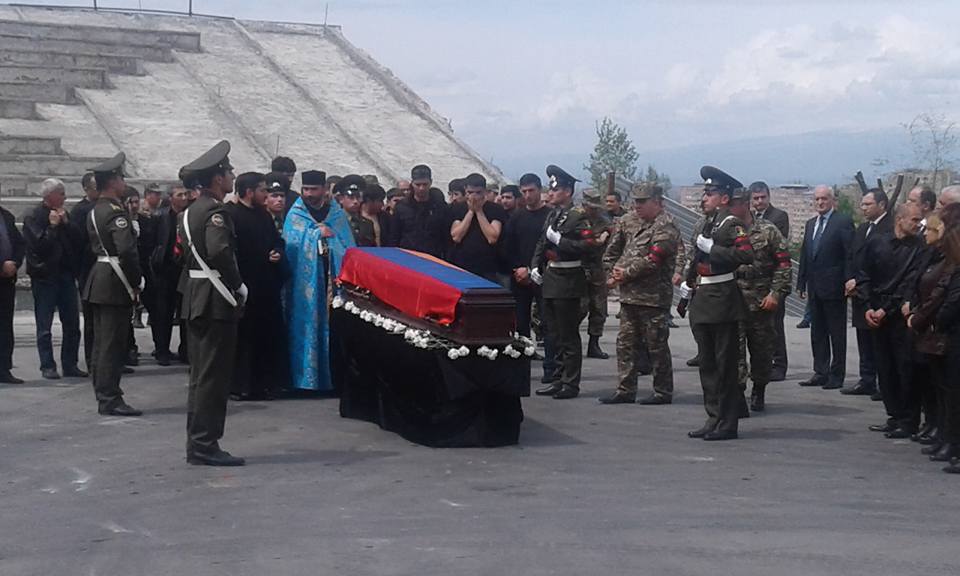 A scene from the funeral of serviceman Adam Sahagyan, which took place on April 12 at Yerablur (Photo: Ara Keuhnelian)