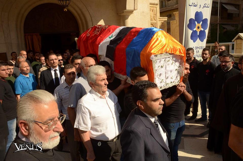 After the service, Bchakjian’s casket was taken to his final resting place as his comrades sang the Armenian revolutionary song, 'Verkerov Li.' (Photo: Studio Venus)