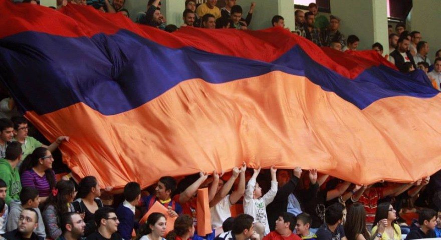 'It is in our hands and no one else's.' (Photo: Homenetmen basketball fans proudly waive the Armenian tricolor, Lebanon, 2014)
