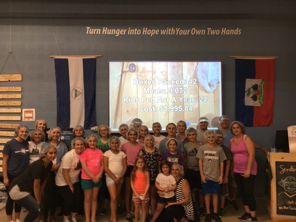 AYF members packaged 42 boxes of food for Feed My Starving Children