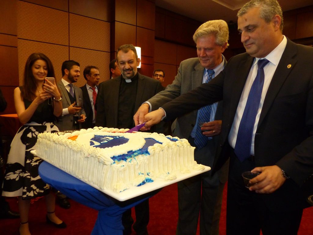 Cutting the celebratory cake (Photo: ANCA)