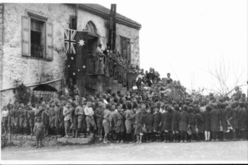 Rev. James Cresswell, Miss Gordon, Hilda King and John Knudsen and some 1700 Armenian orphans at the Armenian Australian Orphanage in Antelias, Lebanon-'flying the Australian flag' 1923. Currently Holy Site of Cilicia Catholicosate.